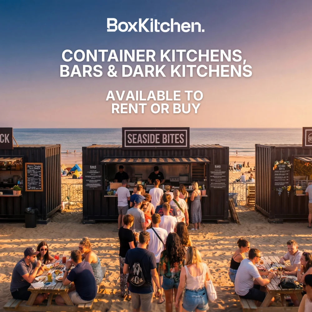 BoxKitchen square ad: container kitchens, bars and dark kitchens available to rent or buy, over a busy beachside food court at sunset